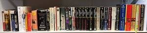 Shelf Full Of Misc Books And Audio Books