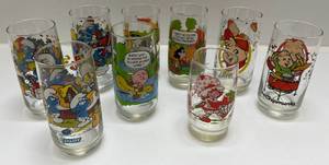 Group Of Misc. 1980s Character Collector Glasses Including Smurfs, The Chipmunks, The Muppets, Strawberry Shortcake And Snoopy
