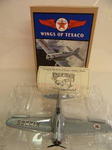 lot 15 image: ERTL COLLECTIBLES TEXACO WINGS OF TEXACO 193 NORTHROP GAMMA AIRPLANE DIE-CAST METAL BANK - IN BOX - GREAT PIECE - NICE - SEE PICTURES