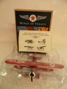 lot 18 image: ERTL COLLECTIBLES TEXACO WINGS OF TEXACO 1931 STEARMAN BIPLANE DIE-CAST METAL BANK - IN BOX - GREAT PIECE - NICE - SEE PICTURES