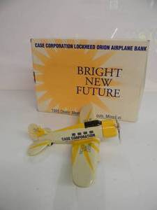 lot 25 image: LIBERTY CLASSICS By SPEC CAST LIMITED EDITION -  CASE CORP. LOCKHEAD ORION AIRPLANE DIE-CAST METAL BANK - IN BOX - GREAT PIECE - NICE - SEE PICTURES