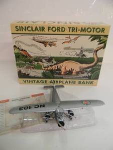 lot 42 image: LIBERTY CLASSICS By SPEC CAST LIMITED EDITION 1 oF 5000 - SINCLAIR FORD TRI-MOTOR AIRPLANE DIE-CAST METAL BANK - IN BOX - GREAT PIECE - NICE - SEE PICTURES
