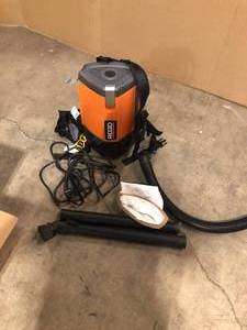 lot 49 image: RIDGID 6 Qt. NXT Backpack Vacuum Cleaner with Filters and Locking Accessories for Dry Applications   Customer Returns See Pictures