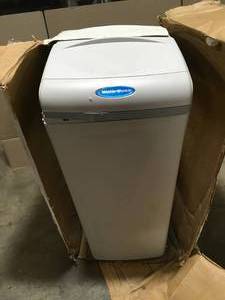 lot 33 image: Waerboss and Reg 30 in. Acid Neutralizer Whole House Water Filter System  Customer Returns See Pictures