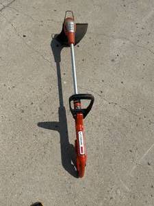lot 15 image: Black & Decker 20 Volt Lithium Trimmer (tool only)