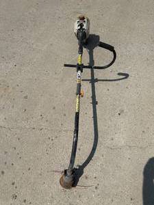 lot 14 image: Ryobi 31cc Trimmer