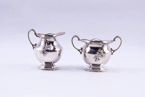 lot 102 image: Quadruple Silverplate Cream and Sugar Set