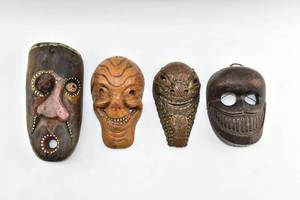 lot 61 image: 4 Carved Wood Masks Nepal, Africa