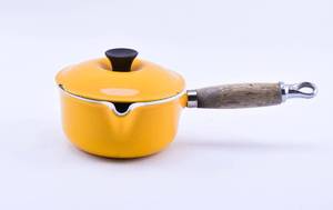 lot 16 image: Vintage Le Creuset #14 Lidded Enamel Cast Iron Sauce Pan in Retro Yellow