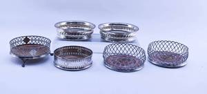 lot 82 image: Group of 6 Vintage Wine Bottle Coasters, Sterling and Silverplate