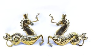 lot 9 image: Pair of Venetian Brass Hippocampus Plaques