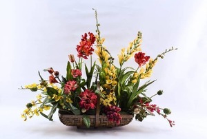 lot 299 image: Faux Floral Arrangement in Dark Basket