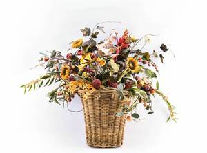 lot 297 image: Faux Floral Arrangement in Wicker Basket