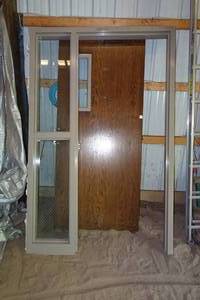 lot 132 image: Commercial Interior Door Frame with Wood Door
