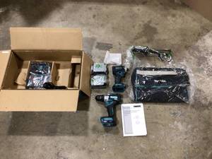 lot 7 image: Makita 40V Max XGT Brushless Cordless 2-Pc. Combo Kit (Hammer Driver-DrillImpact Driver) 2.5Ah  Customer Returns See Pictures