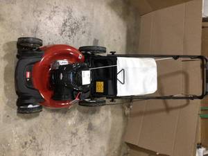 lot 22 image: Toro 21 in. Recycler Briggs and Stratton 140 cc Gas High-Wheel Walk Behind Push Lawn Mower  Customer Returns See Pictures