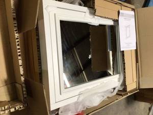 lot 42 image: Home Decorators Collection Fremont 24 in. W x 30 in. H Framed Rectangular Bathroom Vanity Mirror in White   Customer Returns See Pictures