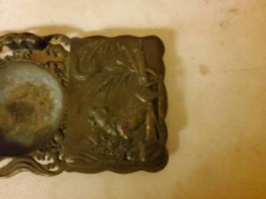 lot 125 image: Vintage ash tray with cigarette  holder, tiger and dragon pattern.