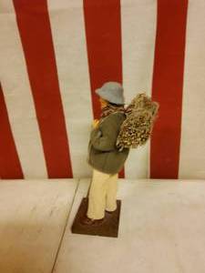 lot 132 image: Hand made man carrying  fire wood, Italy, WWII ERA.