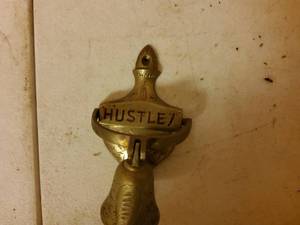 lot 141 image: Vintage brass bathroom door bell