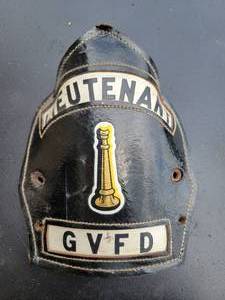 lot 28 image: Golden Valley Fire Dept. Lieutenant Helmut Badge and Firemans Boots