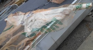 Netted house wrap over 8 feet tall unknown length.