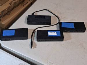 lot 89 image: Lot of (4) Dell Docking Stations D3100