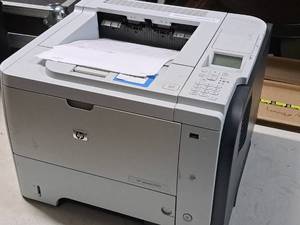 lot 10 image: HP LaserJet P3015 CE528A