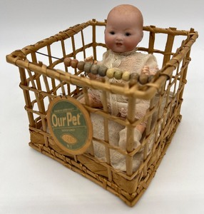 lot 11 image: Vintage Seco OUR PET Germany Doll and Playpen