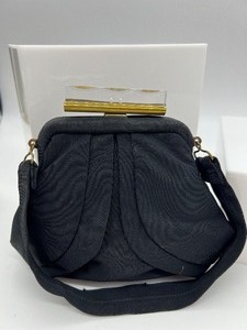 lot 19 image: Vintage Black Handbag with Lucite Handle, Cosmetic  Cigarette Case, Glasses & More