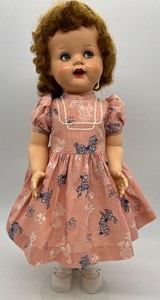 lot 68 image: Vintage Ideal Saucy Walker 1950s Doll - Pink Dress