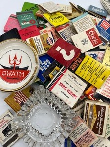 lot 121 image: Vintage Matchbooks, Lighter and Ashtrays