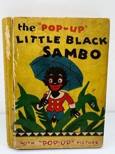lot 35 image: Vintage Plastic Black Americana Mammy Doll with Pop-up Little Black Sambo book and Miniature Figurines