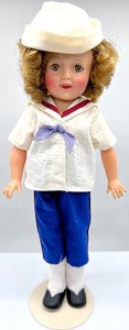 lot 38 image: Pair of SHIRLEY TEMPLE Dolls with Vintage Glass Tumbler