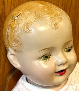 lot 117 image: Vintage Composite Baby Doll and Vintage Wooden Highchair
