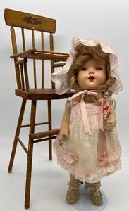 lot 166 image: Vintage Composition Doll and Wood Highchair