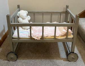 lot 169 image: Vintage Painted Wood Crib with Metal Wheels