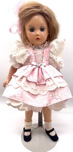lot 221 image: Vintage Madame Alexander Doll with Retro Green Vintage Dresser