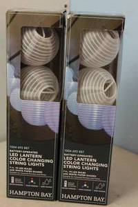 lot 124 image: NEW - 2 PACKS - Hampton Bay OutdoorIndoor 7 ft. 10-Light Battery Powered Paper Lantern Mini Bulb LED String Light (Multi-Color) MSRP $14.97 842674049578