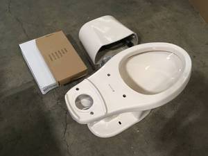 lot 20 image: Glacier Bay 2-piece 1.28 GPF High Efficiency Single Flush Elongated Toilet in Bone  Customer Returns See Pictures