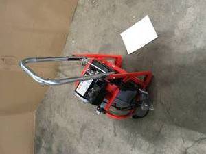 lot 21 image: RIDGID K-400 AutoFeed Drain Cleaning Snake Auger 120-Volt Drum Machine and C-32IW 38 in. x 75 ft. Cable  Customer Returns See Pictures