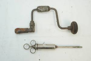 lot 34 image: Hand Drill and Syringe