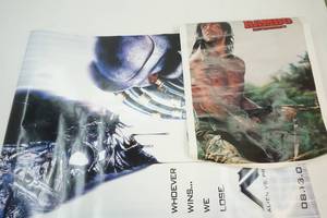 lot 46 image: Alien Vs. Predator Poster and Rambo