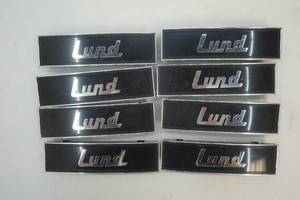 lot 274 image: Vintage Lund Boat Emblems