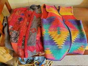lot 334 image: A Vest And A Sweater