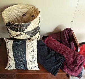 lot 293 image: Woven Basket With Three Blankets And A Throw Pillow