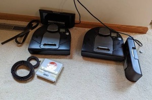lot 36 image: Two Neato Robotics Vacuums