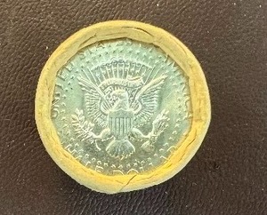 BANK ROLL OF 1967 UNCIRCULATED KENNEDY HALF DOLLARS