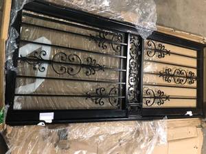 lot 13 image: Grisham 32 in. x 80 in. 409 Series Spanish Lace Steel Black Prehung Security Door   Customer Returns See Pictures