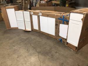 lot 27 image: Lot of Assorted Kitchen Cabinets Customer Returns See Pictures